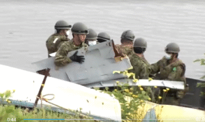Two Self-Defense Force members are missing after a T-4 training jet crashed into a lake in Aichi Prefecture